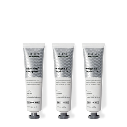 Three tubes of Boka Toothpaste on a white background