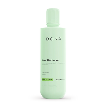 Green bottle of Boka Renew Mouthwash on a white background